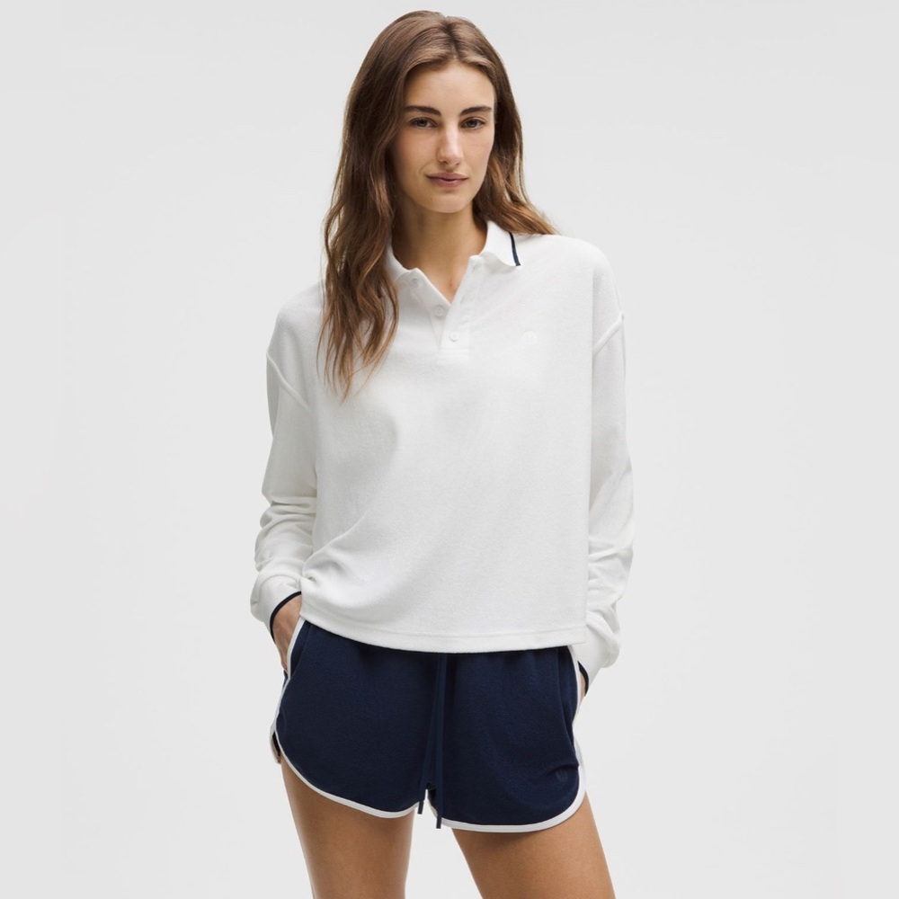 Lululemon Athletica White Polo and Navy Shorts